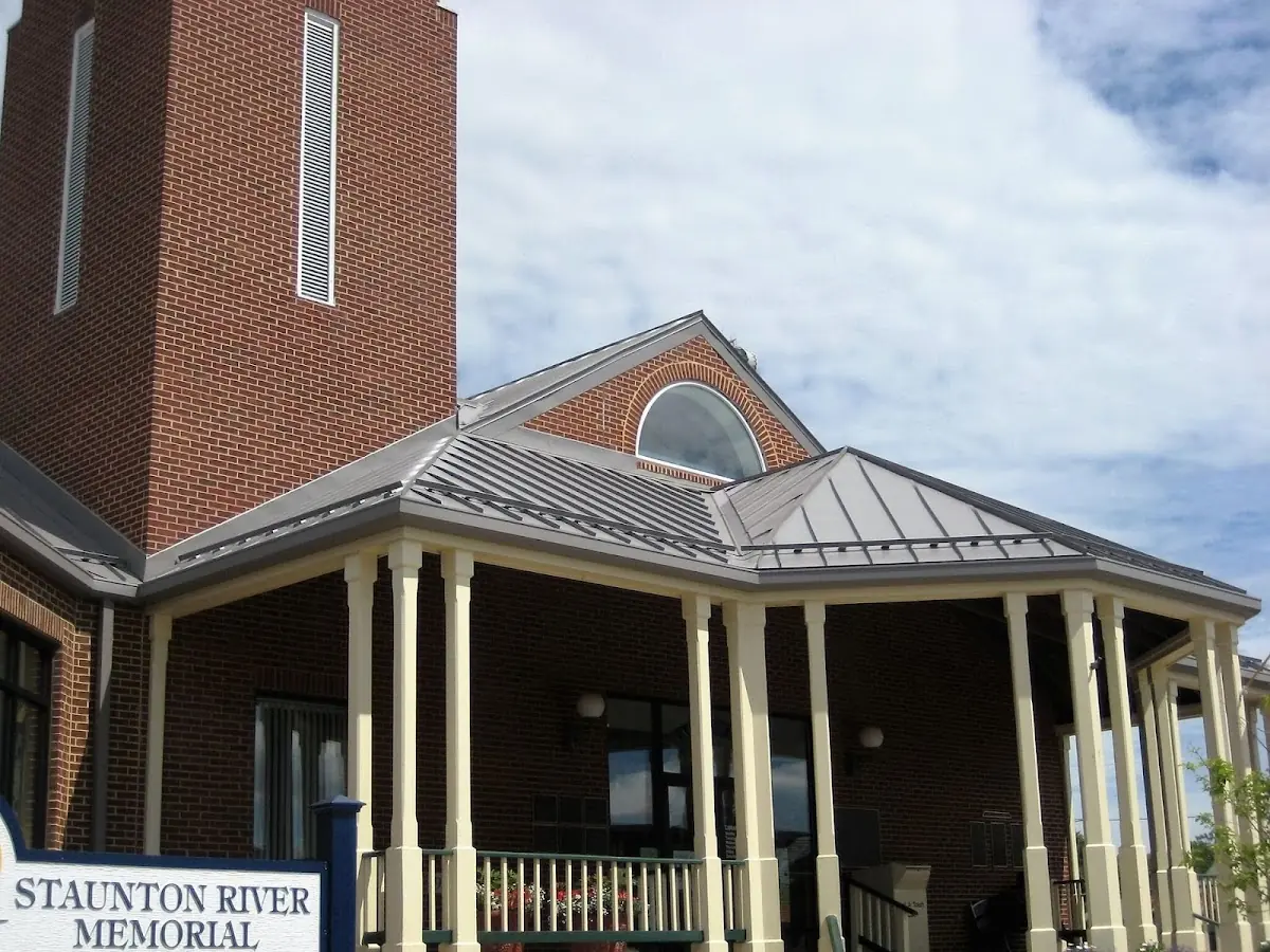 Skilled roofing craftsmen working on a residential roof in Mount Vernon Square